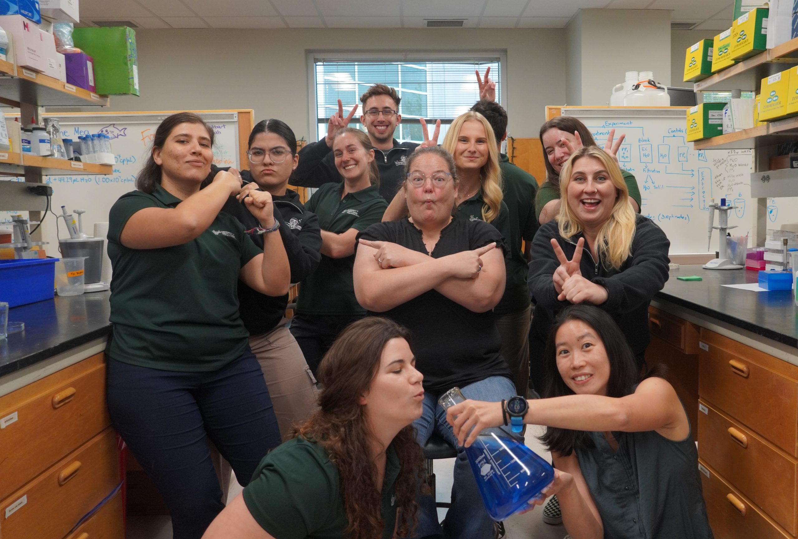 Group of goofy scientists making funny faces for camera